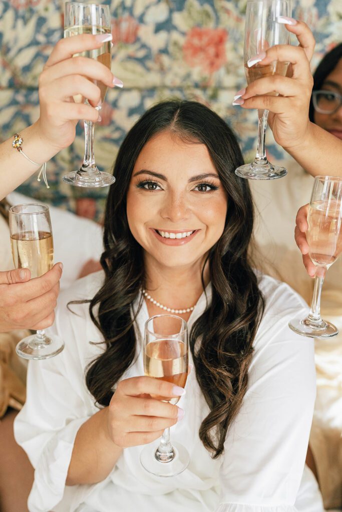 Bride and bridesmaids champagne photos