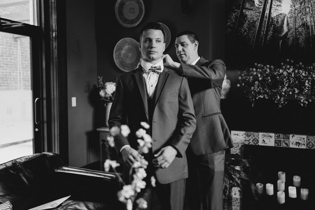 Groom getting ready for wedding ceremony