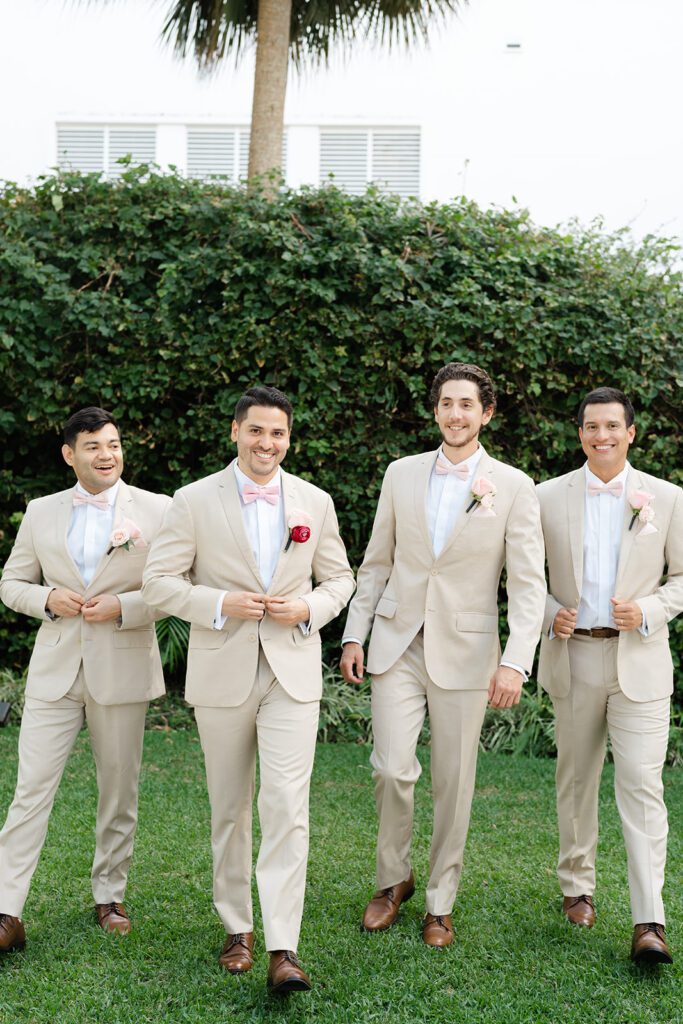 Groom and groomsman portraits from tropical inspired Miami beach wedding