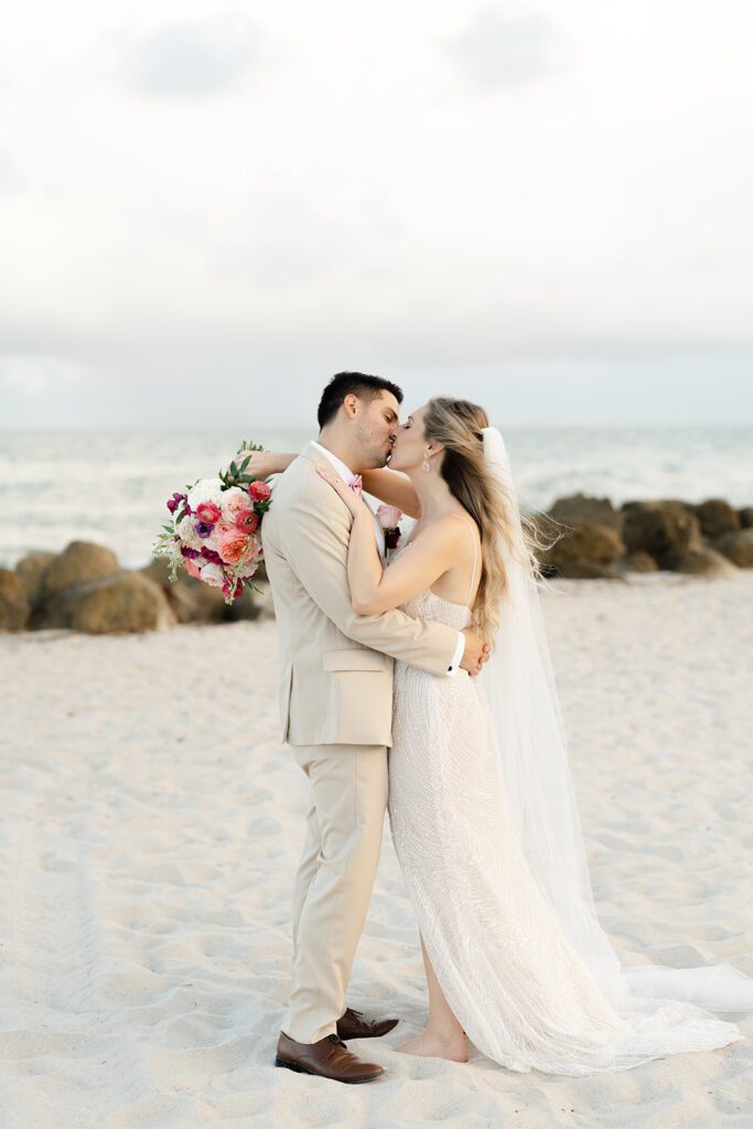 Bride and groom portraits from tropical inspired Miami beach wedding