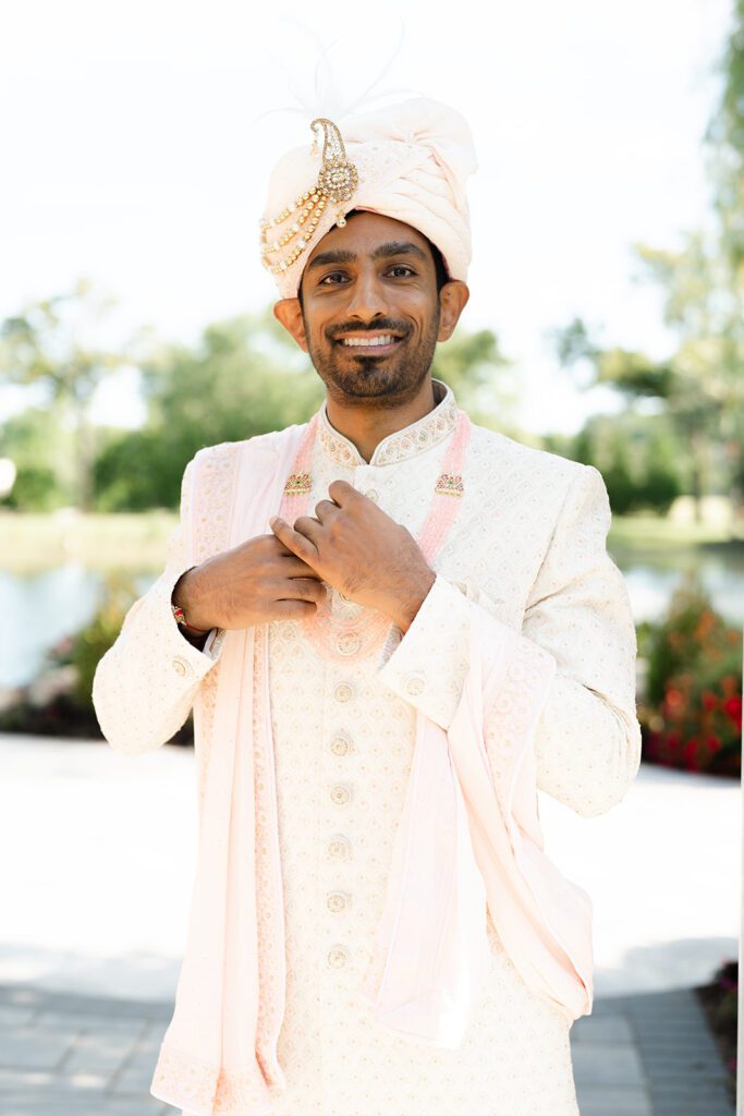 Indian groom posing for portraits
